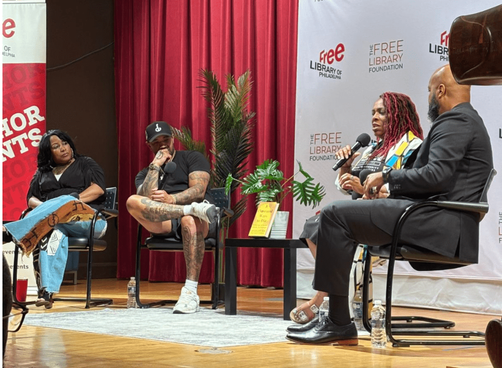 Trymaine Lee, Chantay Love, Pastor Carl Day and Tasnim Sulaiman speaking on stage.